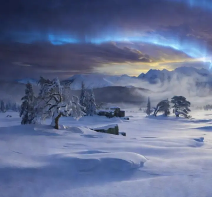A shrouded frozen landscape beneath a dark sky, representing the Eternal Frost of Frozen Shore Tales.